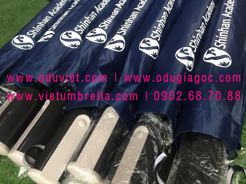 xưởng sản xuất ô dù cầm tay in logo quảng cáo